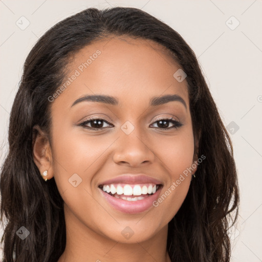 Joyful latino young-adult female with long  brown hair and brown eyes