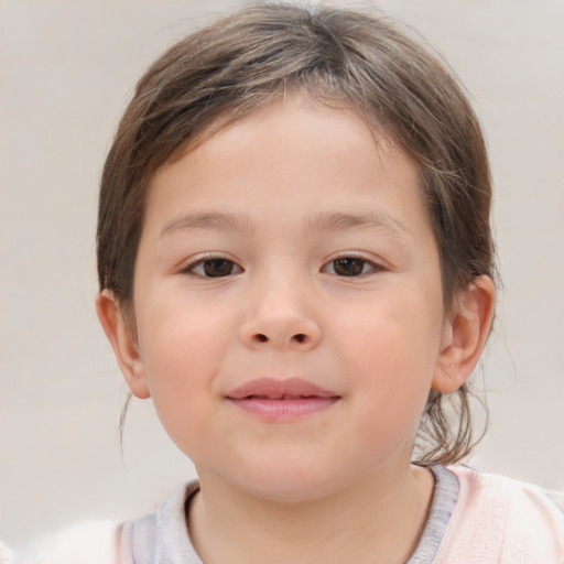 Joyful white child female with short  brown hair and brown eyes