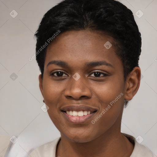 Joyful black young-adult female with short  black hair and brown eyes