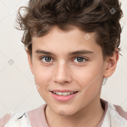 Joyful white child male with short  brown hair and brown eyes