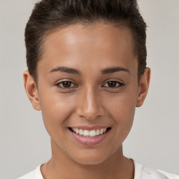 Joyful white young-adult female with short  brown hair and brown eyes