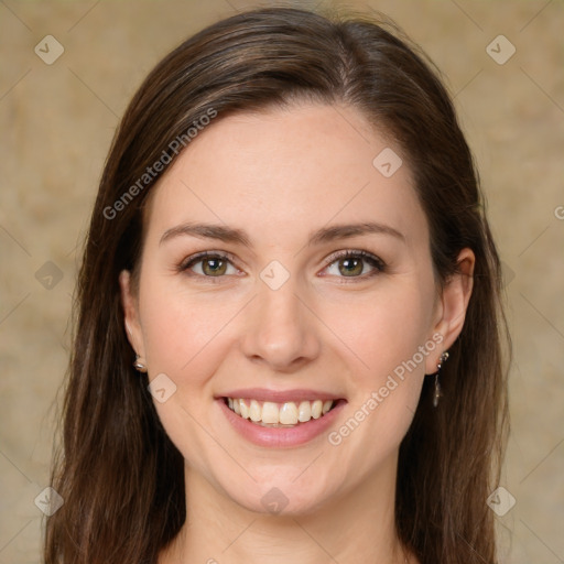 Joyful white young-adult female with medium  brown hair and green eyes