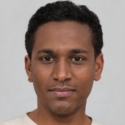 Neutral black young-adult male with short  black hair and brown eyes