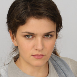 Neutral white young-adult female with medium  brown hair and brown eyes