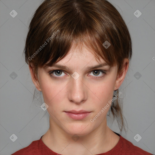 Neutral white young-adult female with medium  brown hair and grey eyes