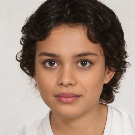 Joyful white child female with medium  brown hair and brown eyes