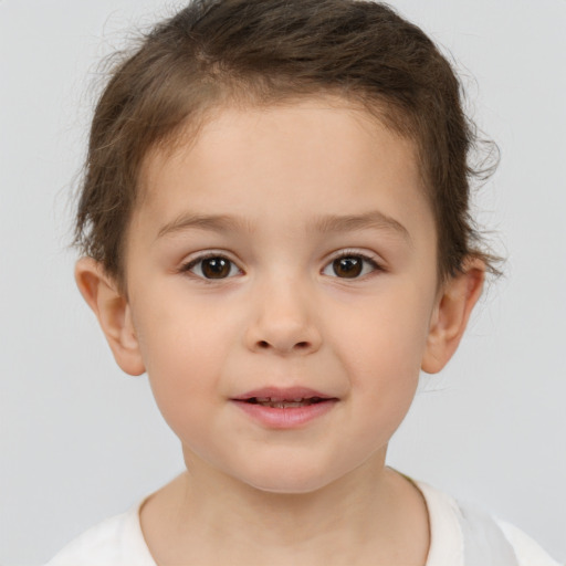 Joyful white child female with short  brown hair and brown eyes