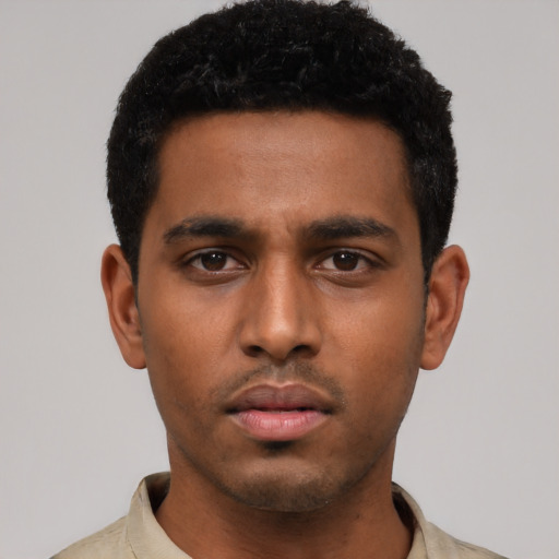 Neutral black young-adult male with short  black hair and brown eyes