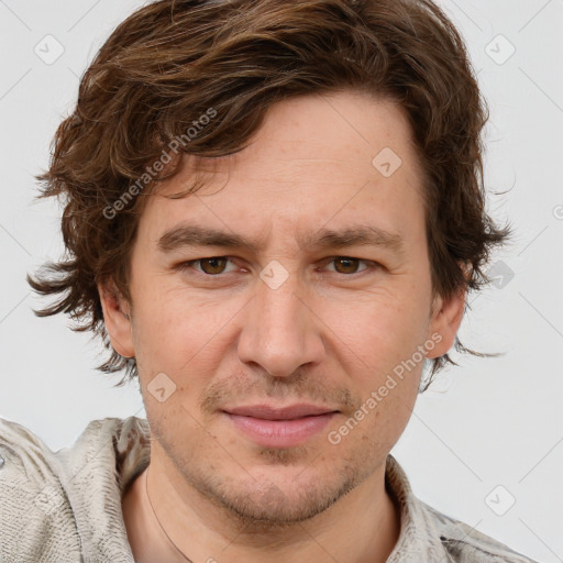 Joyful white adult male with short  brown hair and grey eyes