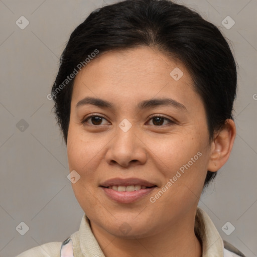 Joyful asian young-adult female with short  brown hair and brown eyes