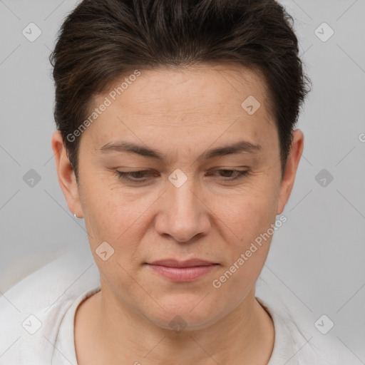 Joyful white adult female with short  brown hair and brown eyes