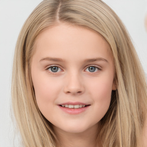 Joyful white child female with long  brown hair and brown eyes