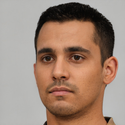 Neutral white young-adult male with short  black hair and brown eyes
