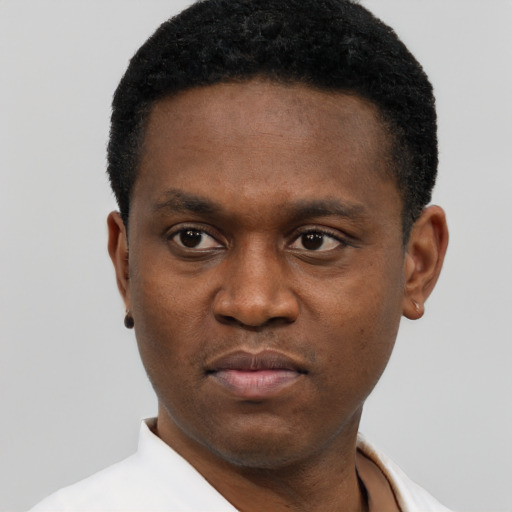 Neutral black young-adult male with short  black hair and brown eyes