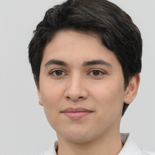 Joyful white young-adult female with short  black hair and brown eyes