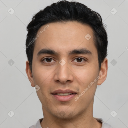 Joyful white young-adult male with short  black hair and brown eyes