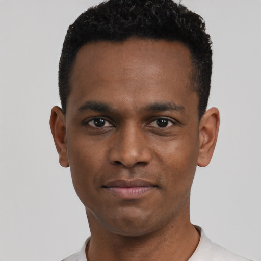 Neutral black young-adult male with short  black hair and brown eyes