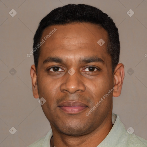 Joyful black young-adult male with short  black hair and brown eyes