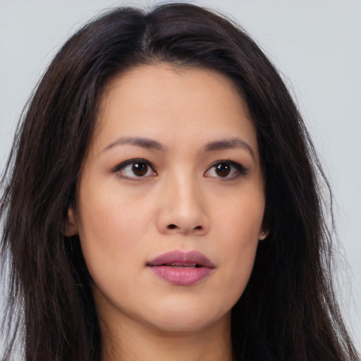 Neutral asian young-adult female with long  brown hair and brown eyes