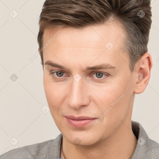 Neutral white young-adult male with short  brown hair and brown eyes