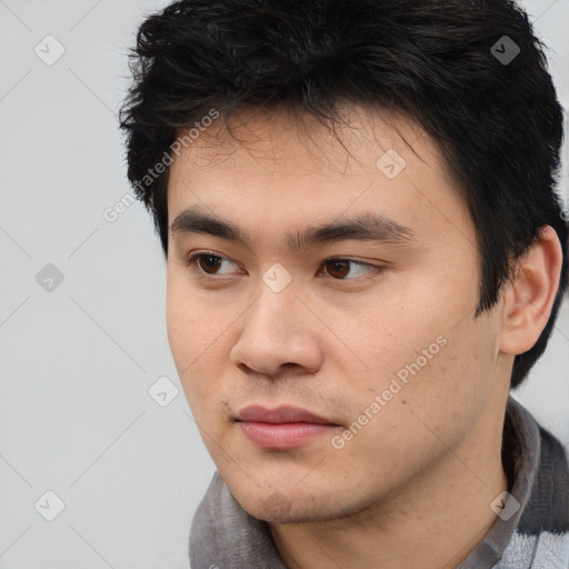 Neutral asian young-adult male with short  black hair and brown eyes