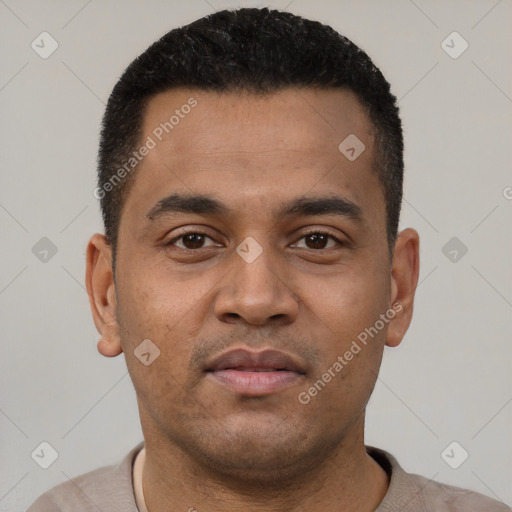 Neutral latino young-adult male with short  brown hair and brown eyes