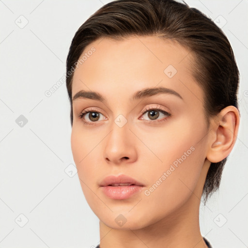 Neutral white young-adult female with medium  brown hair and brown eyes