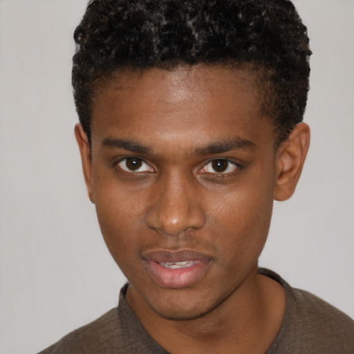Neutral black young-adult male with short  brown hair and brown eyes