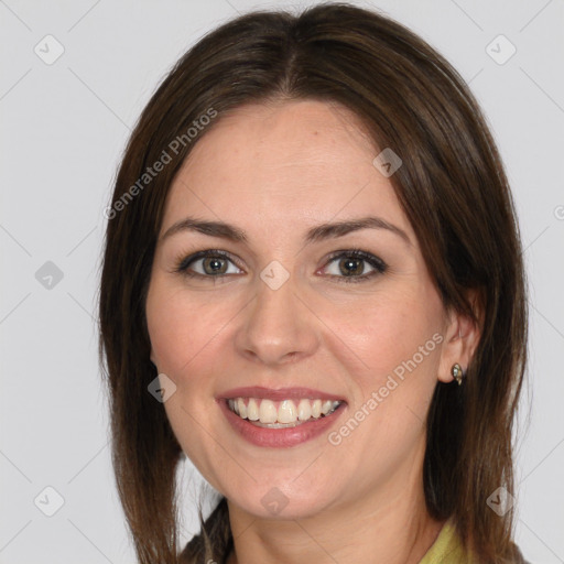 Joyful white young-adult female with medium  brown hair and grey eyes