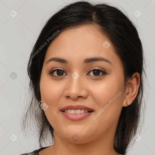 Joyful asian young-adult female with medium  brown hair and brown eyes