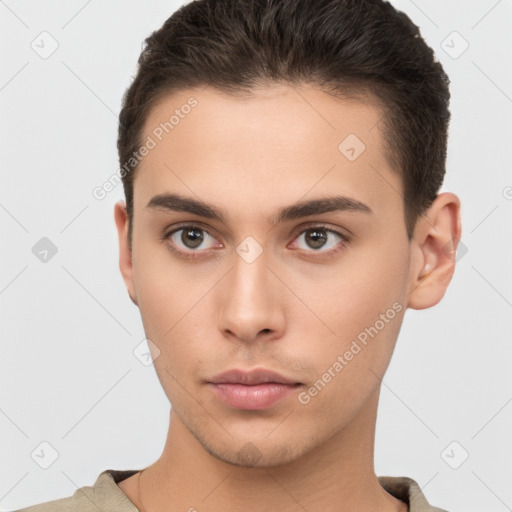 Neutral white young-adult male with short  brown hair and brown eyes