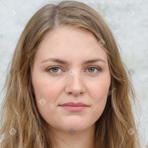 Joyful white young-adult female with long  brown hair and green eyes