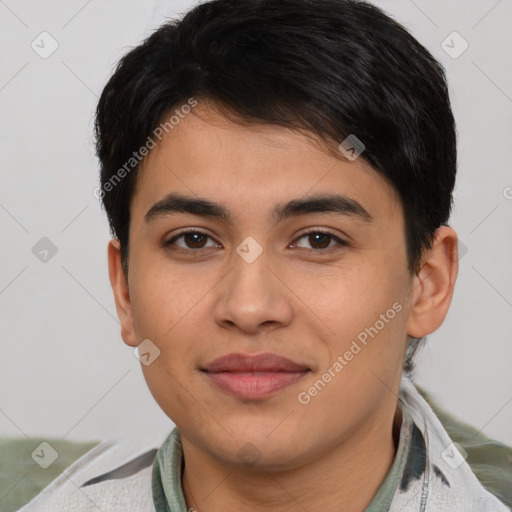 Joyful asian young-adult male with short  brown hair and brown eyes