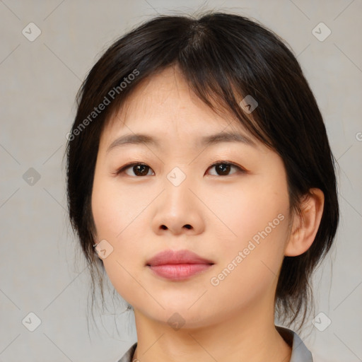 Neutral asian young-adult female with medium  brown hair and brown eyes