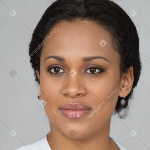 Joyful black young-adult female with medium  brown hair and brown eyes