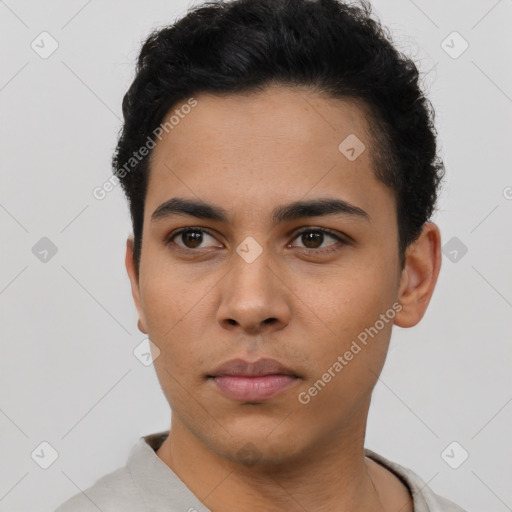 Neutral latino young-adult male with short  black hair and brown eyes