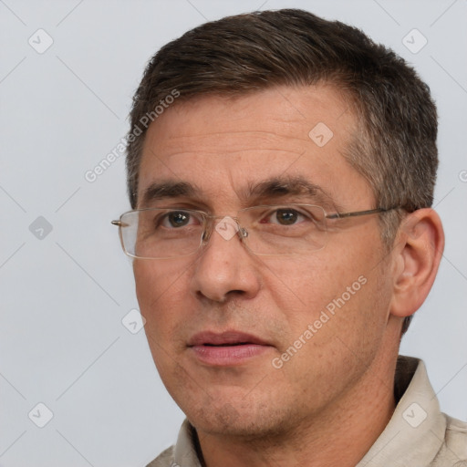 Neutral white adult male with short  brown hair and brown eyes