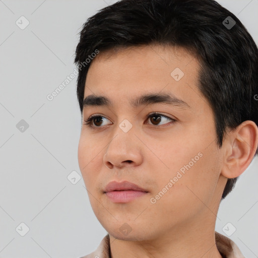 Neutral white young-adult male with short  black hair and brown eyes