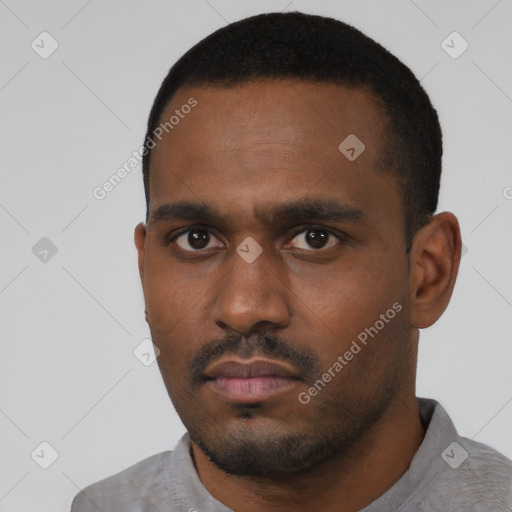Neutral latino young-adult male with short  black hair and brown eyes