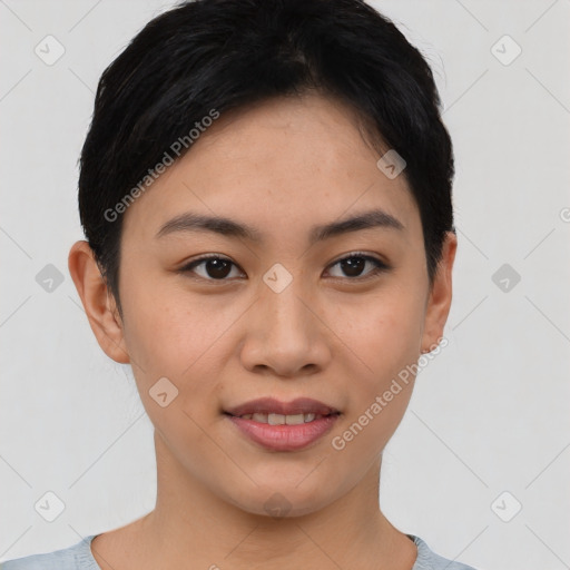 Joyful asian young-adult female with short  brown hair and brown eyes