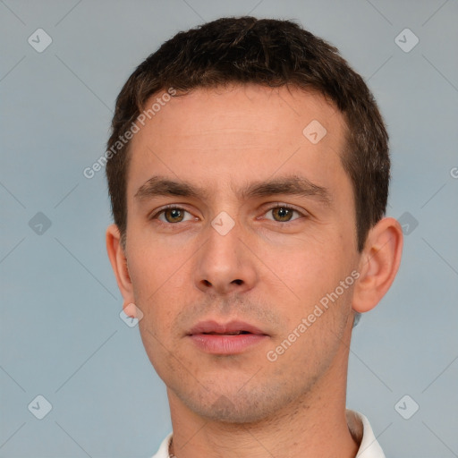 Neutral white young-adult male with short  brown hair and brown eyes