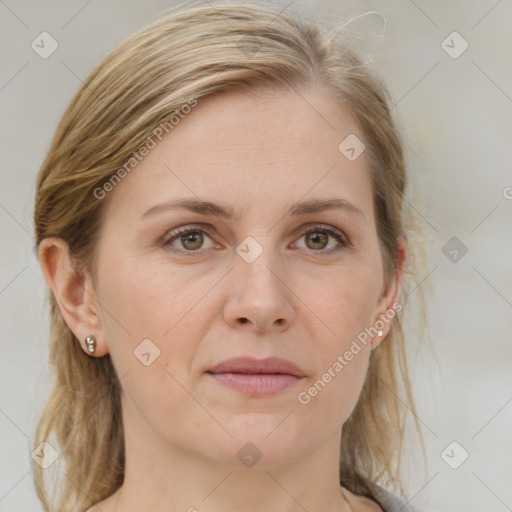 Joyful white adult female with medium  brown hair and grey eyes