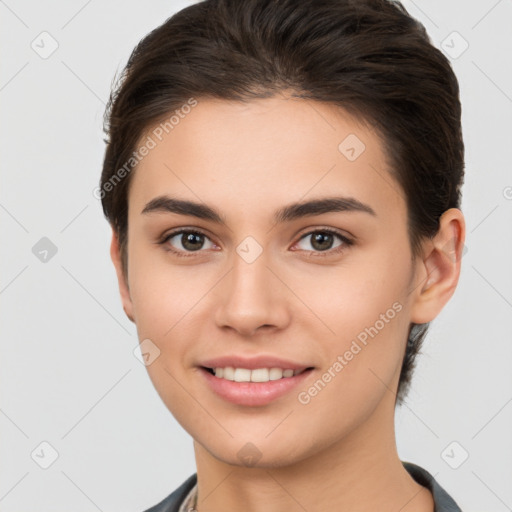 Joyful white young-adult female with short  brown hair and brown eyes