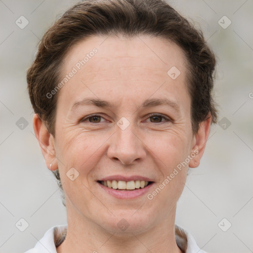 Joyful white adult female with short  brown hair and brown eyes