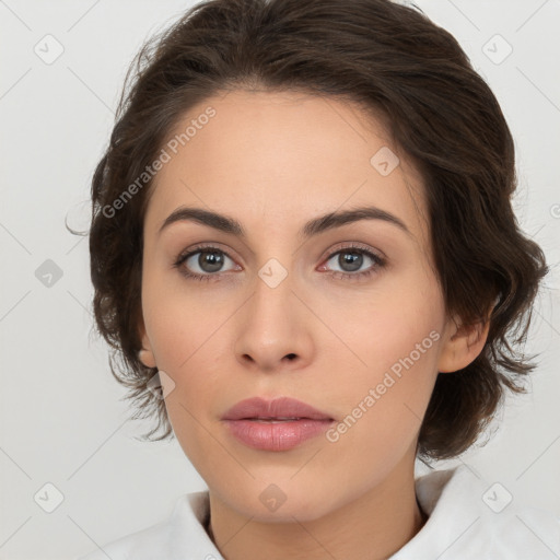 Neutral white young-adult female with medium  brown hair and brown eyes