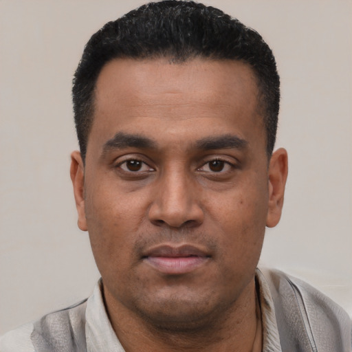 Neutral latino young-adult male with short  black hair and brown eyes