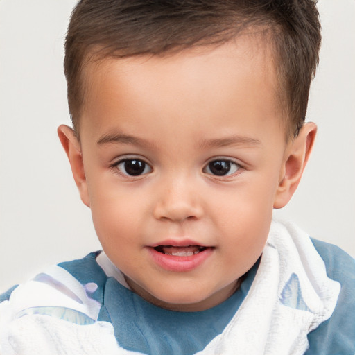 Joyful white child male with short  brown hair and brown eyes