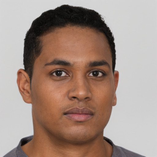 Neutral black young-adult male with short  brown hair and brown eyes