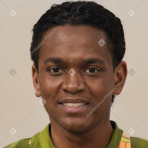 Joyful black young-adult male with short  black hair and brown eyes