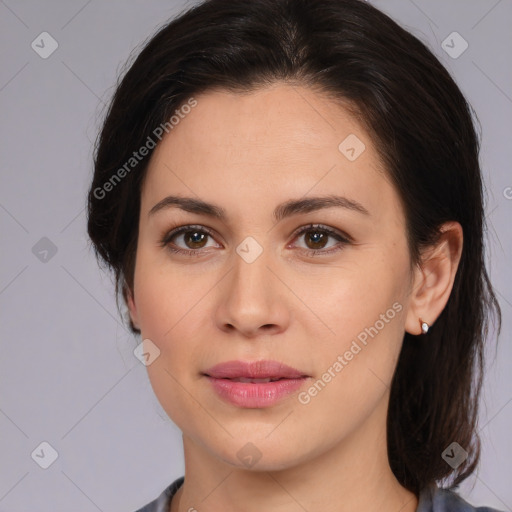 Joyful white young-adult female with medium  brown hair and brown eyes